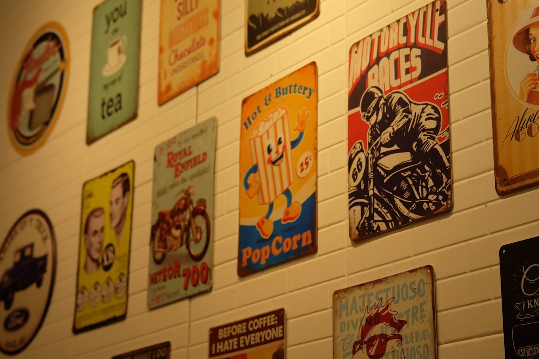 A wall with a bunch of posters on it