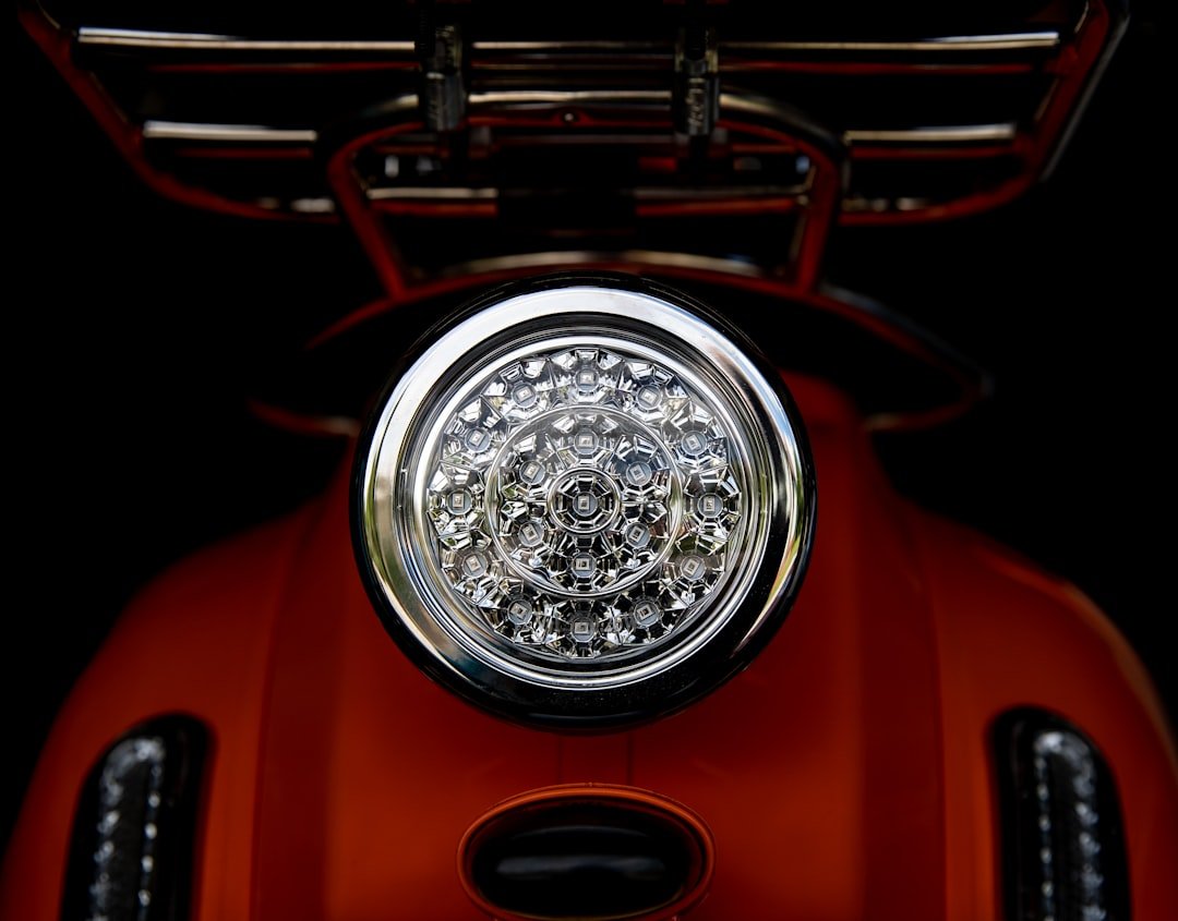 a close up of a motorcycle's headlight