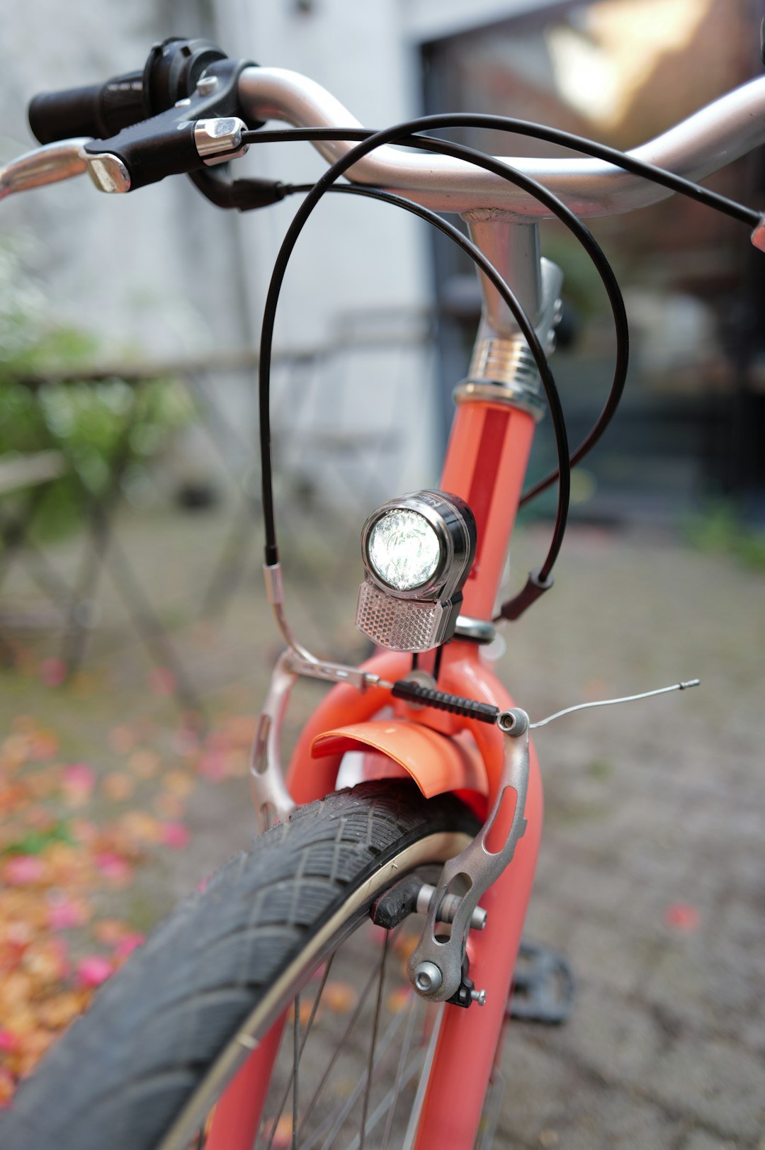Here is a possible caption: a close-up shot of a bicycle's front.