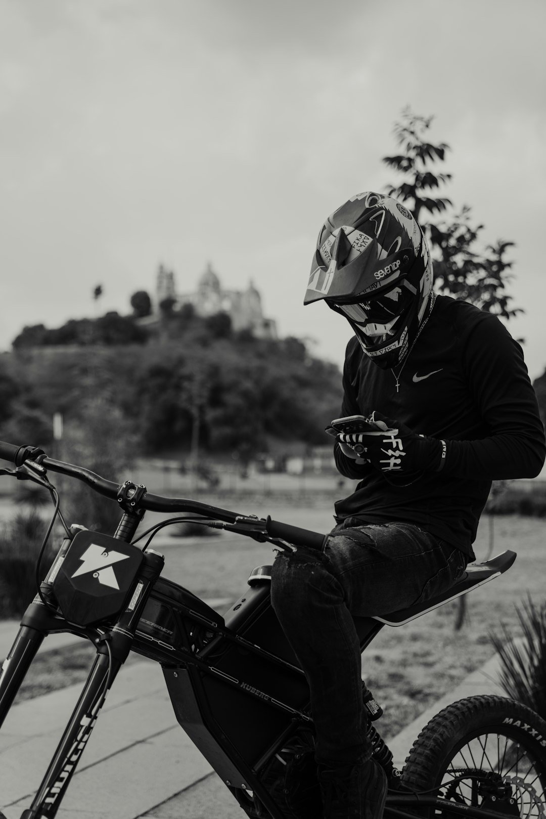 a man sitting on top of a dirt bike