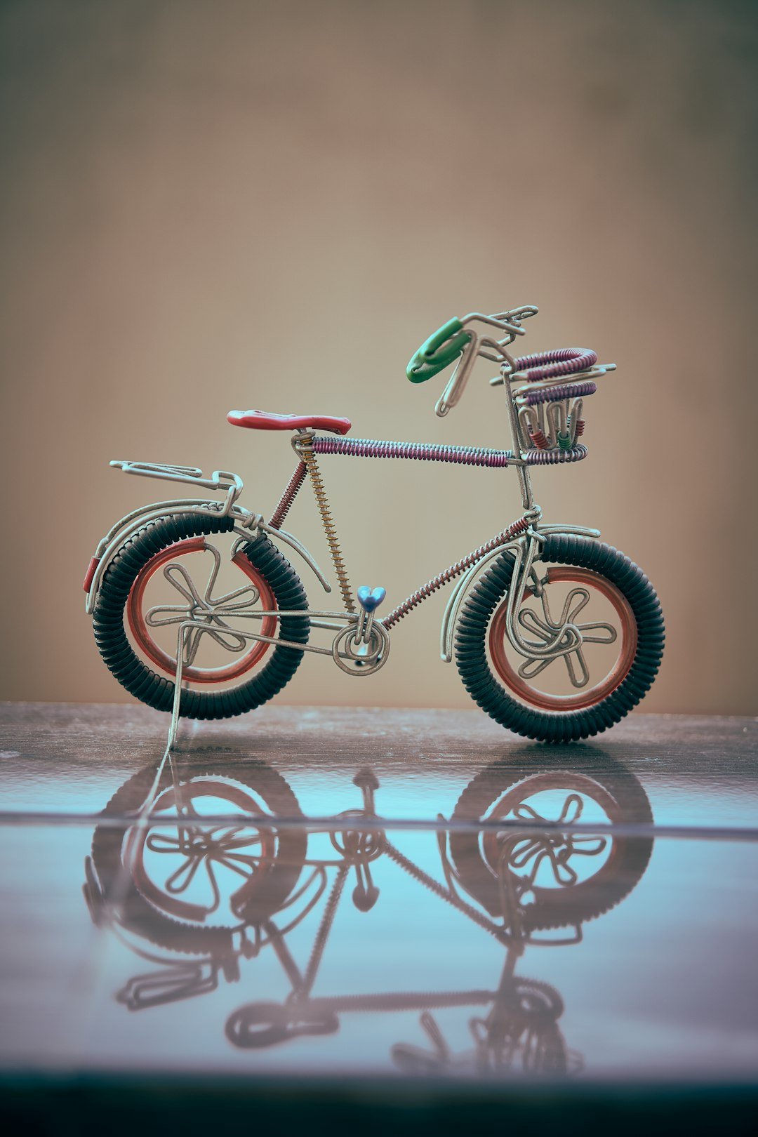 red and black bicycle on white snow covered ground