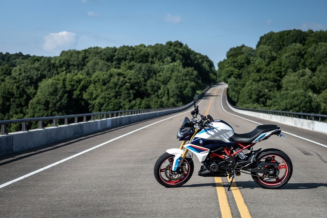 a motorcycle parked on the side of a road