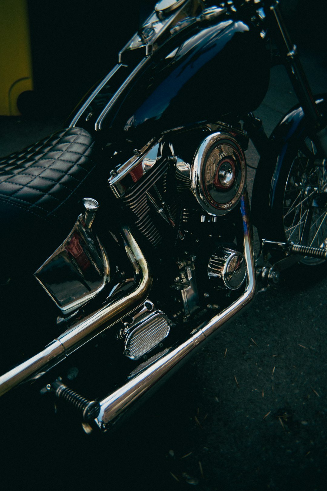 a close up of a motorcycle parked on a street