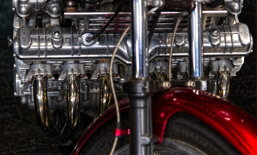 Close-up of a shiny motorcycle engine and handlebars
