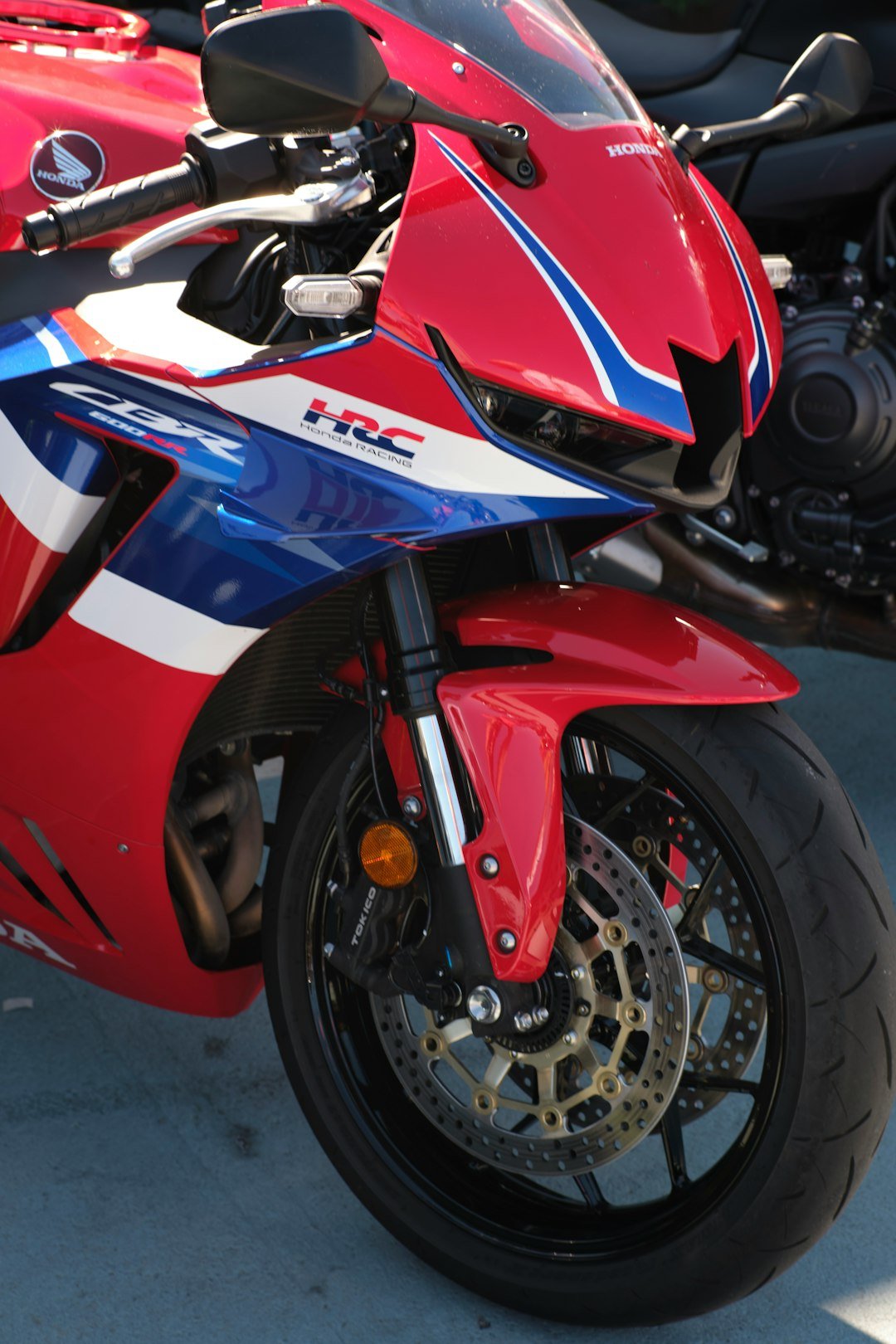 Red and blue sport motorcycle with hrc logo