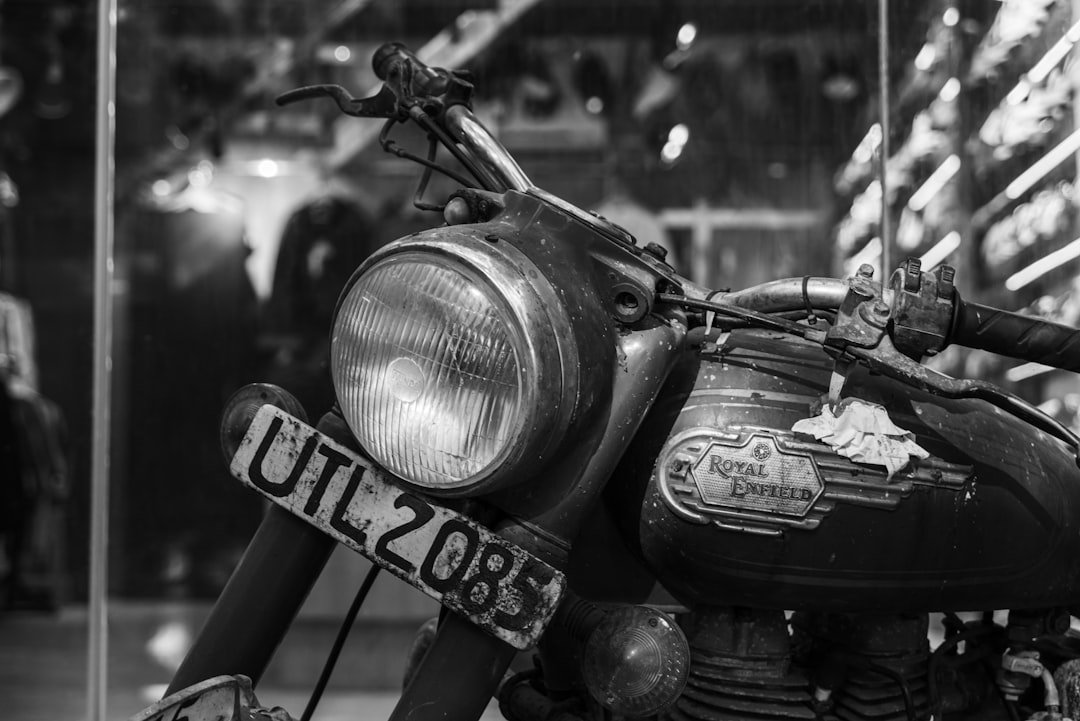 Vintage royal enfield motorcycle with license plate utl 2085