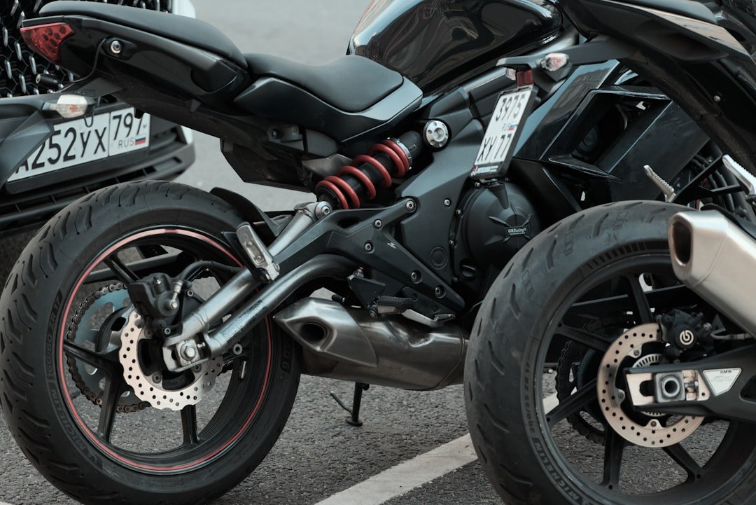 Black motorcycle parked on a street