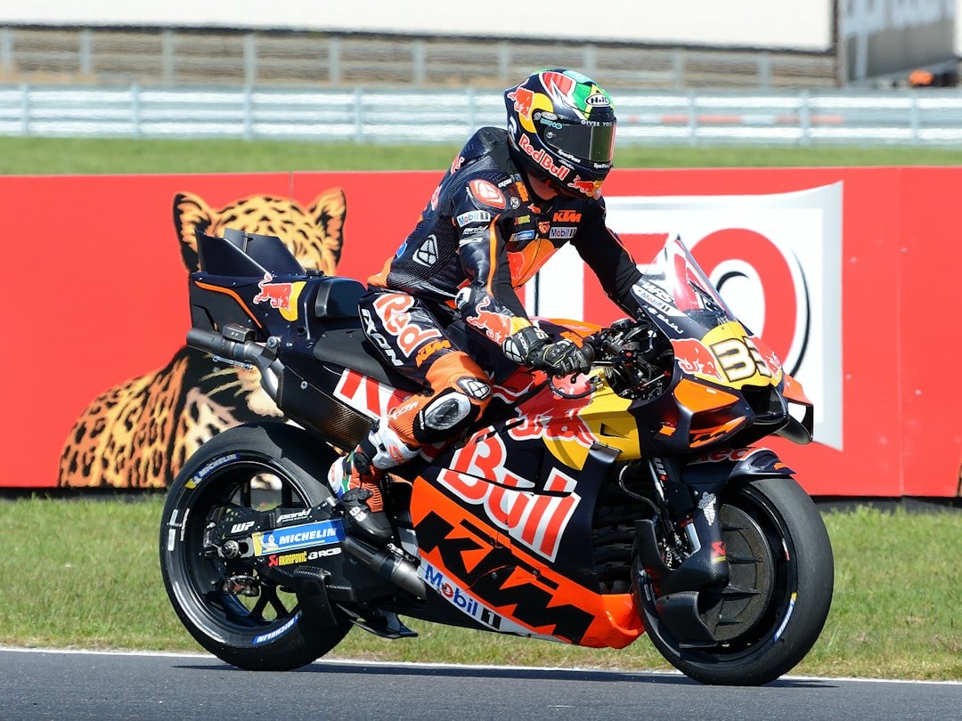 Motorcyclist in racing gear on a ktm motorcycle