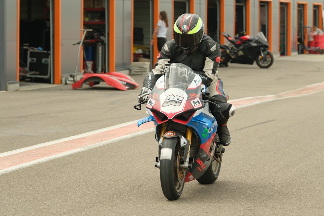 Racer on motorcycle on track