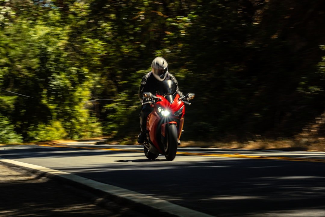 a man riding a motorcycle