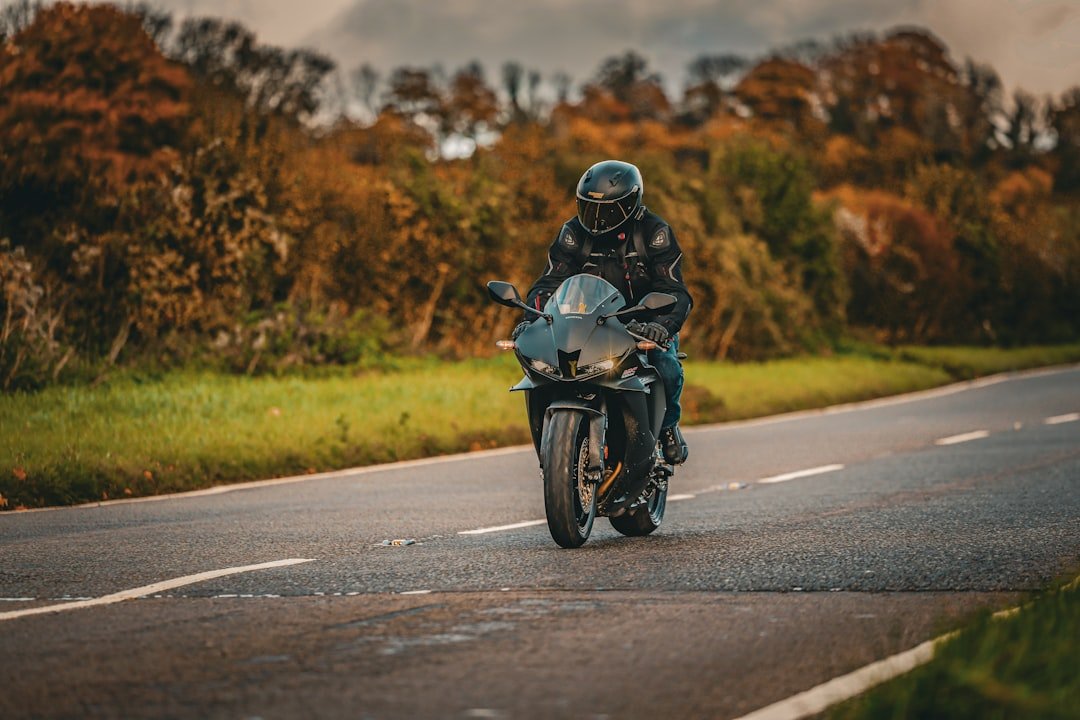 Rider on a motorcycle on a paved road