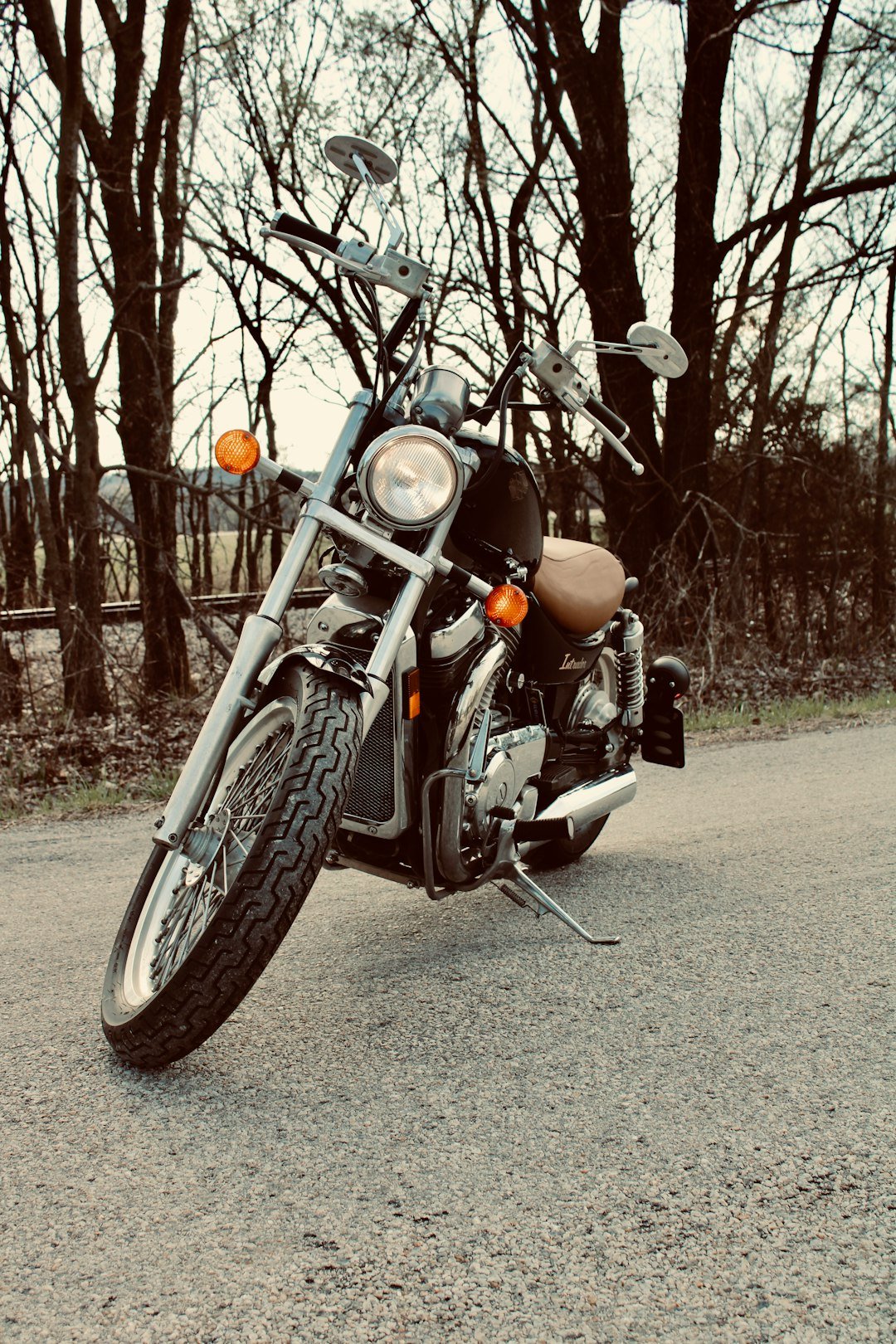 a motorcycle parked on a road