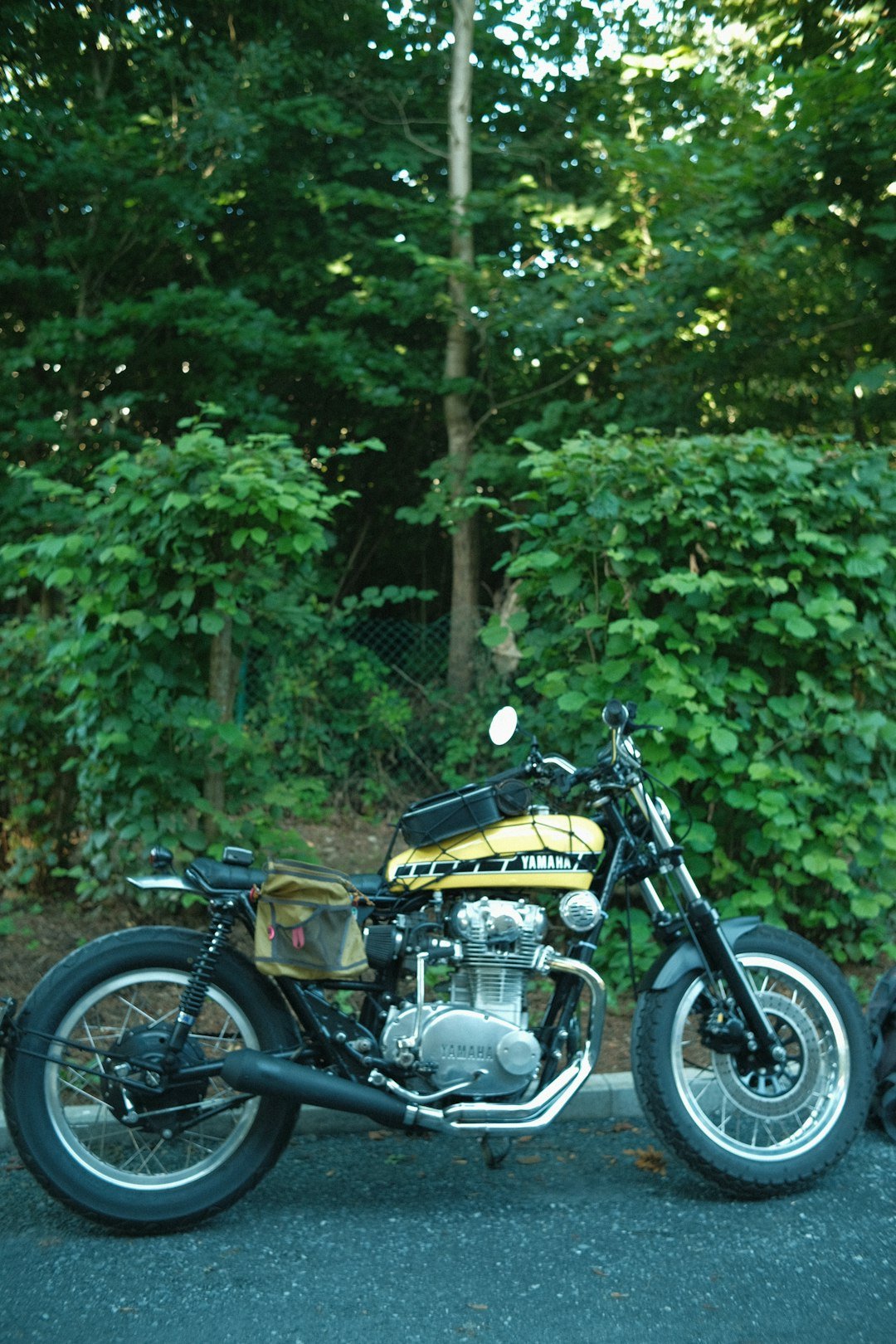 A motorcycle parked on the side of the road