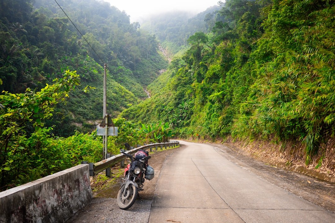 a motorcycle parked on the side of a road