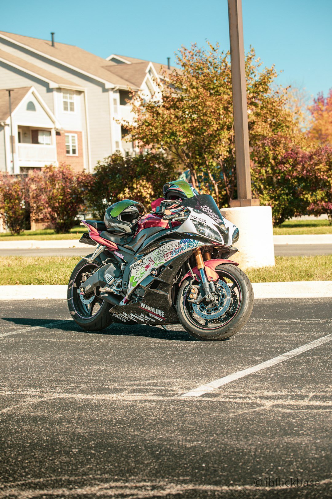A sport motorcycle parked in a parking lot.