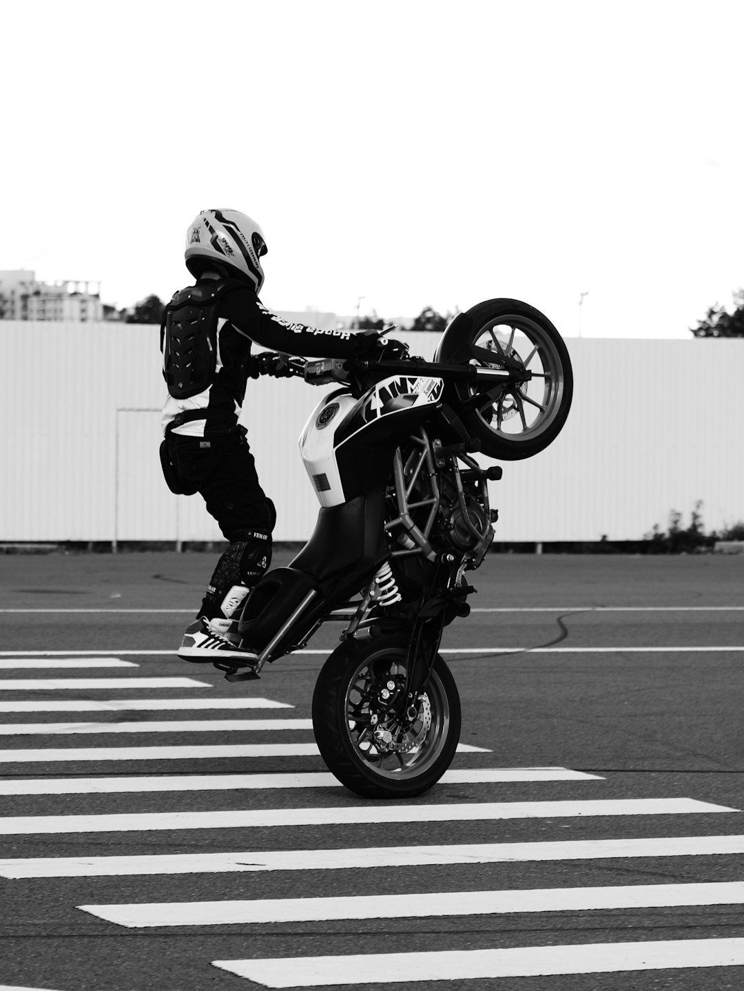 a person on a motorcycle doing a trick