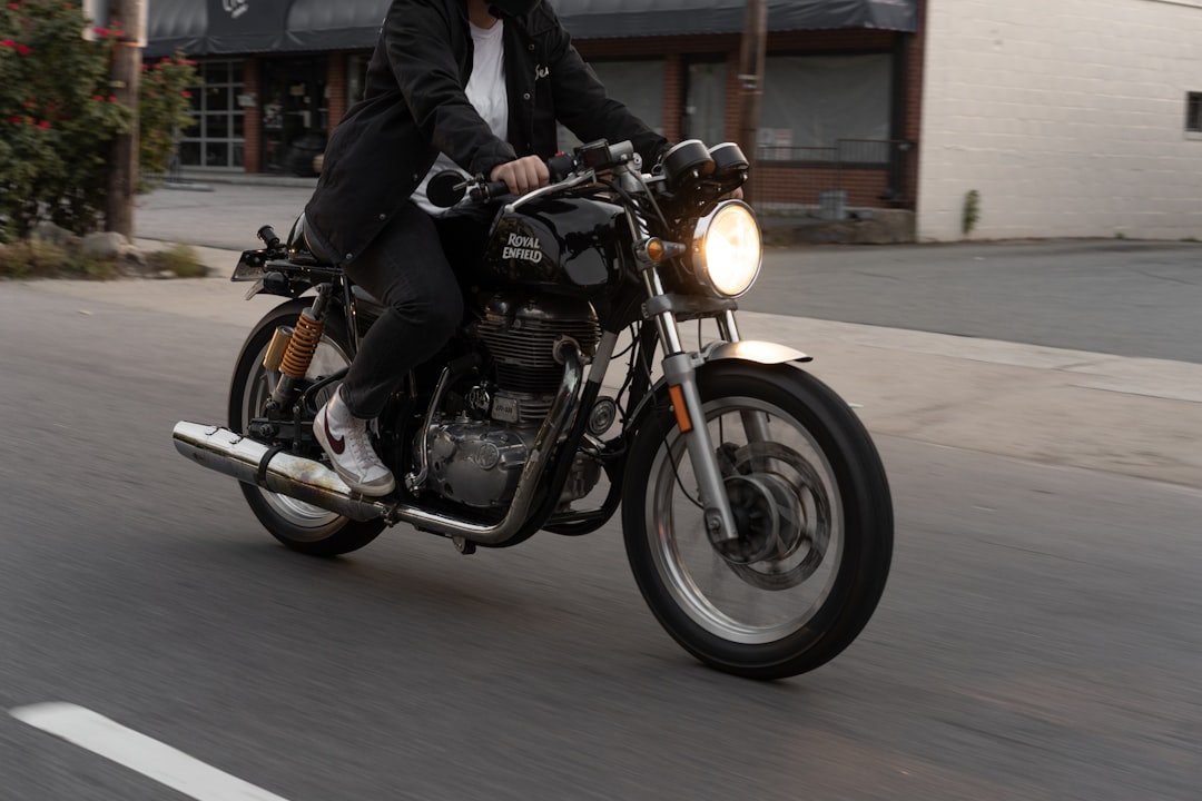 a man riding a motorcycle