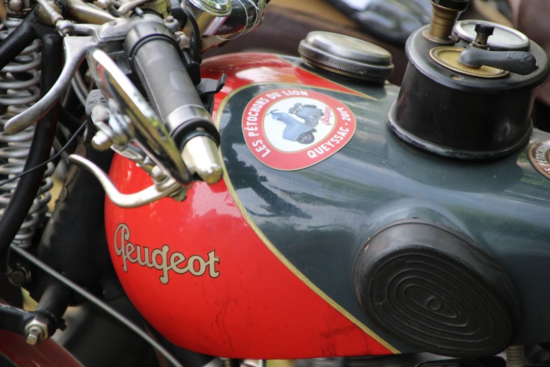 a close up of a red and black motorcycle