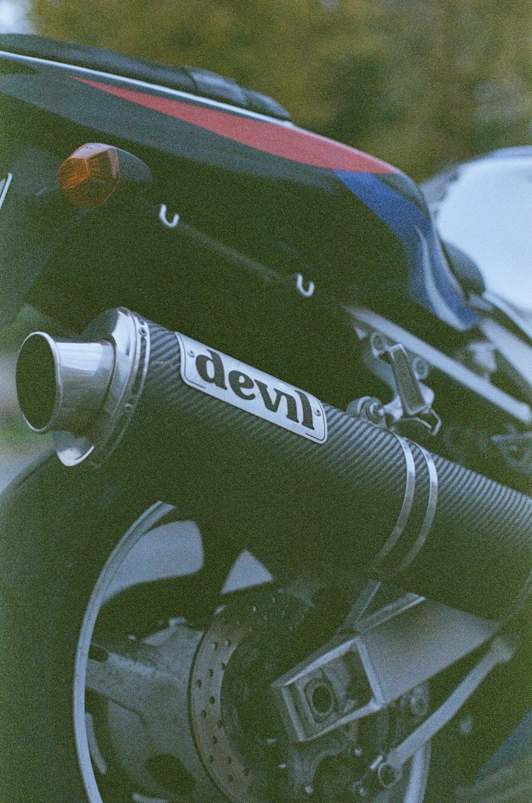 a close up of a motorcycle's exhaust system
